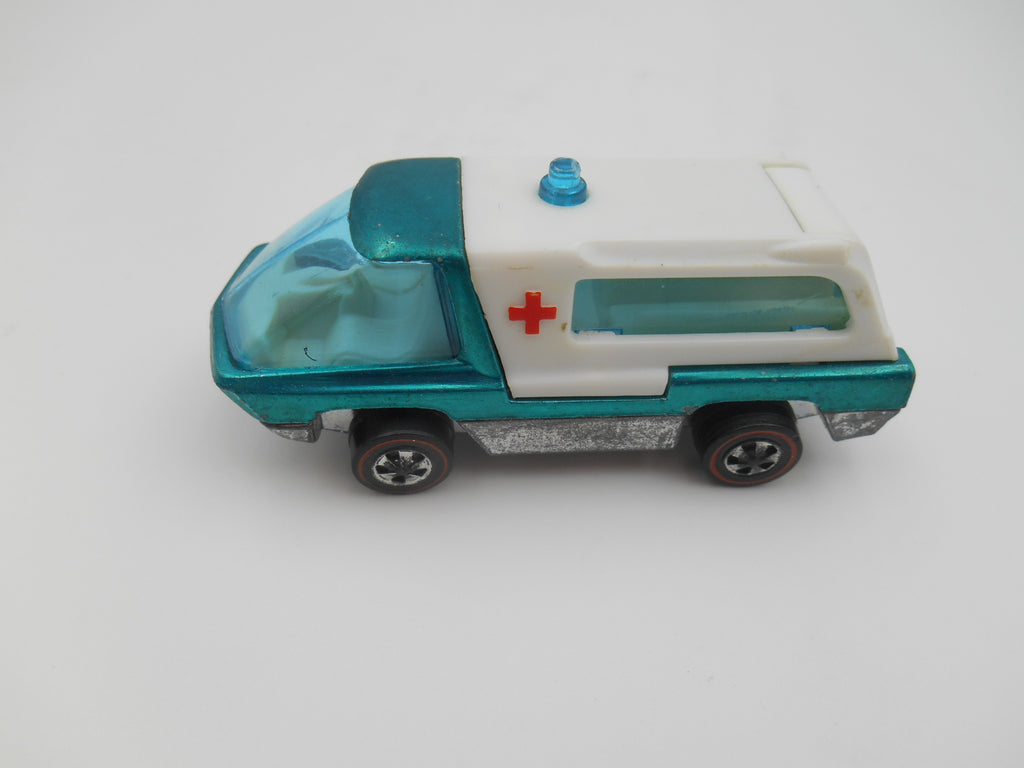 Vintage Hot Wheels Heavyweights Ambulance – Redline Era metallic aqua/teal cab