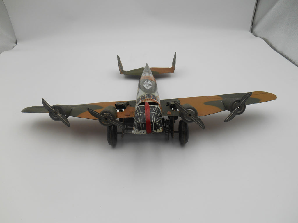 Vintage Tin Wind-Up Four Engine Bomber Airplane Toy