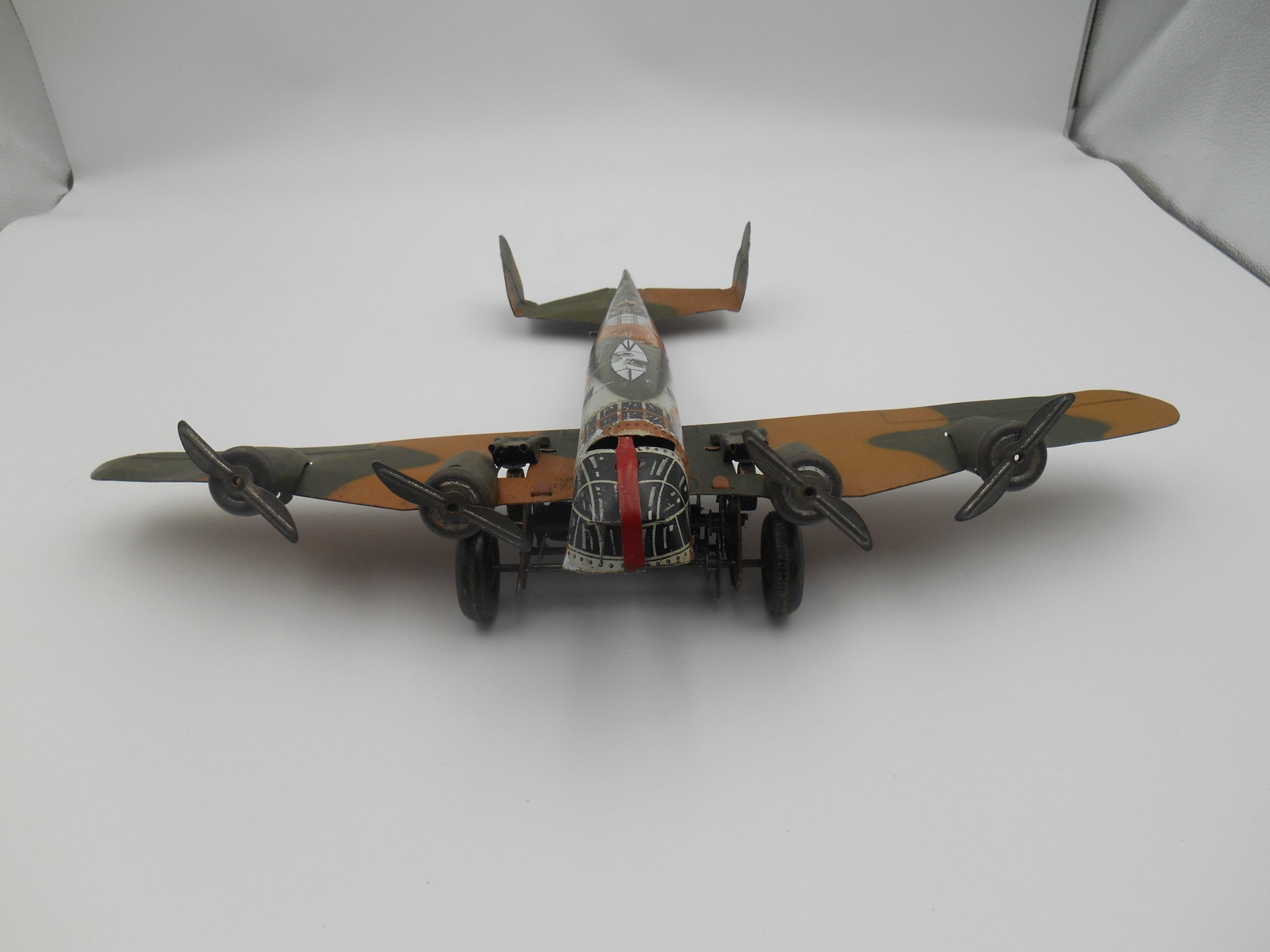 Vintage Tin Wind-Up Four Engine Bomber Airplane Toy