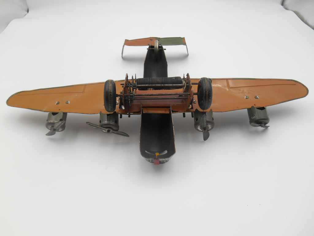 Vintage Tin Wind-Up Four Engine Bomber Airplane Toy