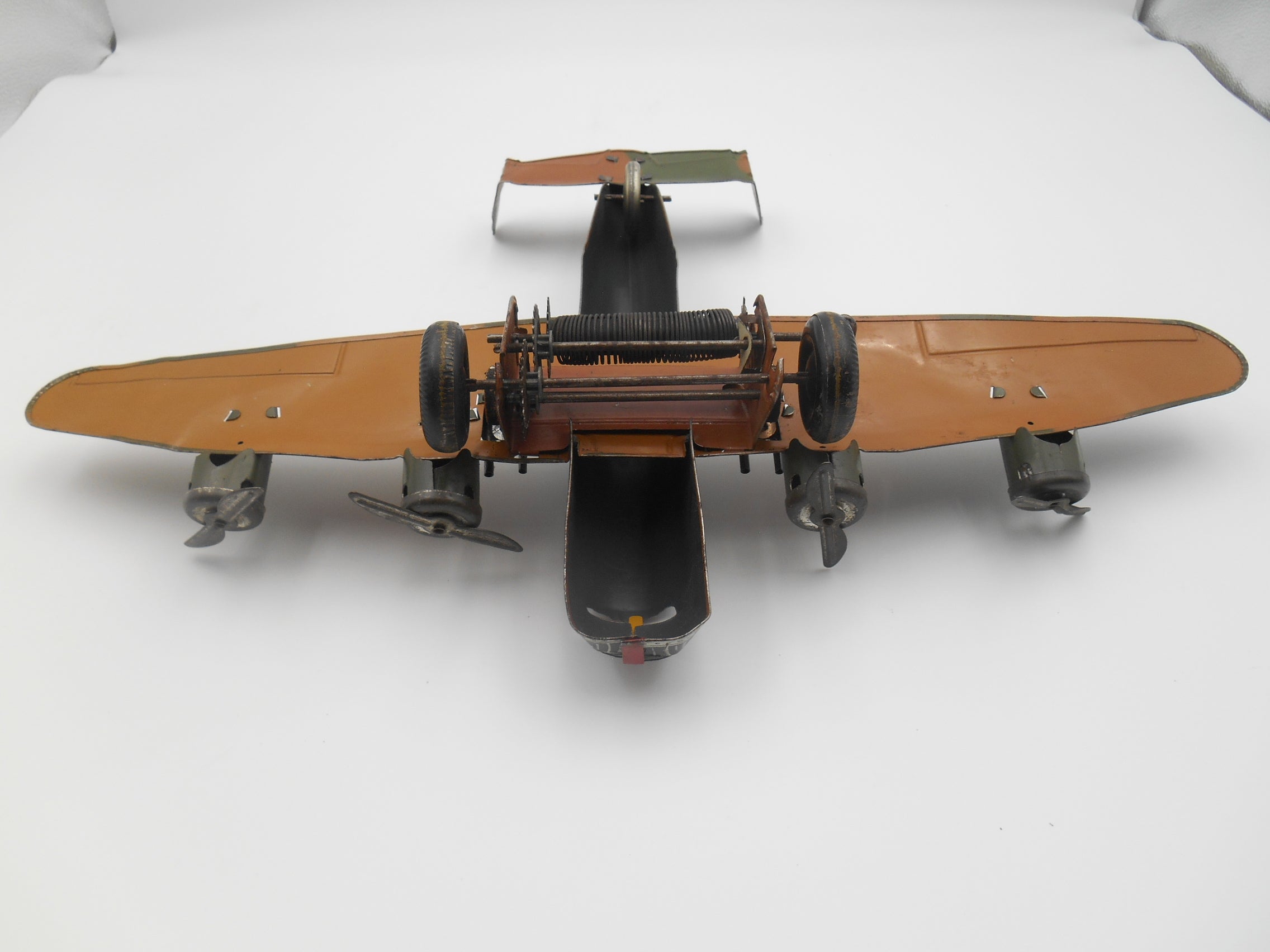 Vintage Tin Wind-Up Four Engine Bomber Airplane Toy